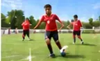 Students playing football together on the school field